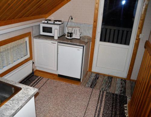 廚房, 赫基圖帕農家樂 (Maatilamatkailu Heikin Tupa) in 托伊薩