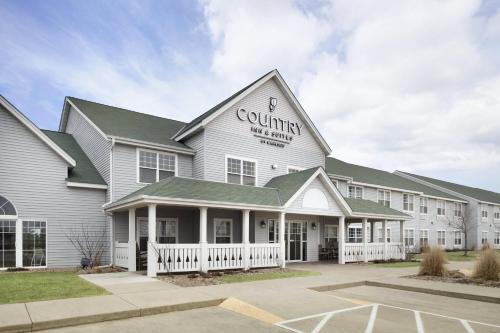 Вход, Country Inn & Suites by Radisson, Grinnell, IA in Гриннелл