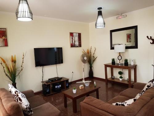Koplietošanas atpūtas telpa ar TV, Hostal Paraiso Tocopilla in Tocopilla