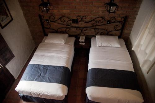 Hotel Casa Indigo The 3-star Hotel Casa Índigo offers comfort and convenience whether youre on business or holiday in San Cristobal De Las Casas. The property has everything you need for a comfortable stay. Service-m