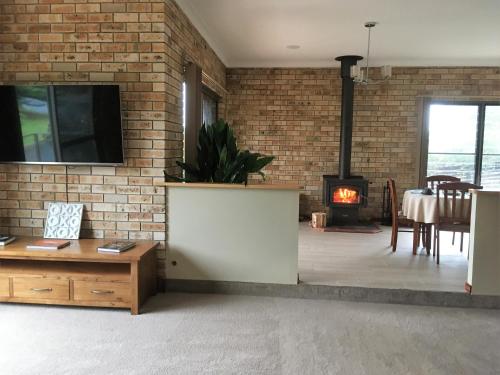 Shared lounge/TV area, Riverside Rest Nambucca Heads in Nambucca Heads