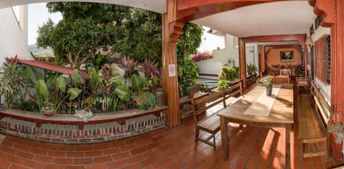 Balcony/terrace, Macondo Hostel in San Gil