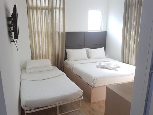 胡鲁马累快捷旅馆 胡鲁马累快捷旅馆