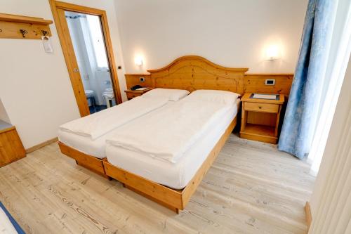 Hotel Garni Sottobosco Room Type - Quadruple Room with Balcony