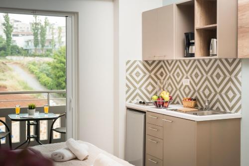Kitchen, IRINI STALOS Apartments in Nea Kidonia