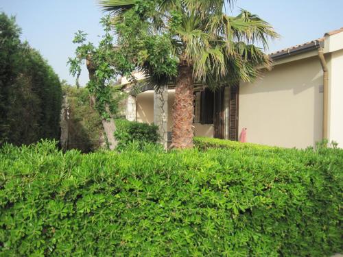  Casa vacanza con giardino in residence, Pension in Campofelice di Roccella bei Cerda