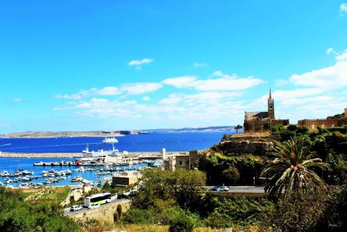 B&B Għajnsielem - Seaview Luxury Penthouse - Bed and Breakfast Għajnsielem