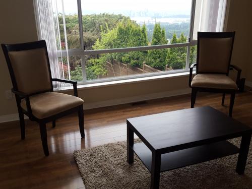 Zajednički dnevni boravak / prostorija s TV-om, Emperial Suites in Vancouver (BC)