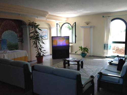 Jagatud salong / TV-ala, Residence Marina Palace in Orosei