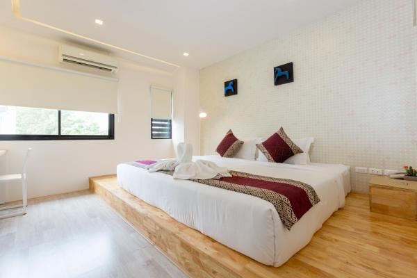 The photo shows the The Guest Arak Boutique Hotel located in the city of Chiang Mai.