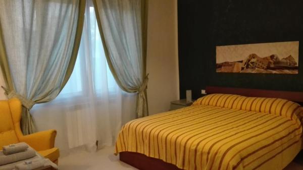 A la foto es mostra l'objecte Casa Millegrü situat a la ciutat de Pisa.