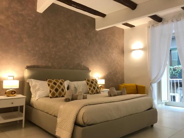Auf dem Foto ist das Objekt Napoli Plebiscito Apartment in der Stadt Neapel zu sehen.