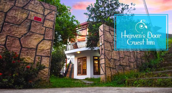 The photo shows the Heavens Door Guest Inn located in the city of Kandy.