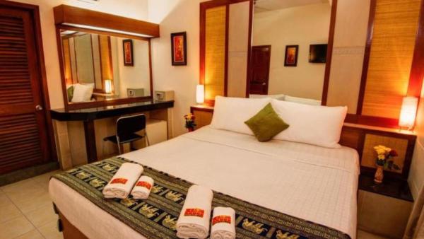 A la foto es mostra l'objecte Bar Oz Riverside Guesthouse situat a la ciutat de Phnom Penh.