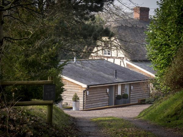 Na fotografii je vidět objekt The Steppes Holiday Cottages nacházející se ve městě Hampton Bishop.
