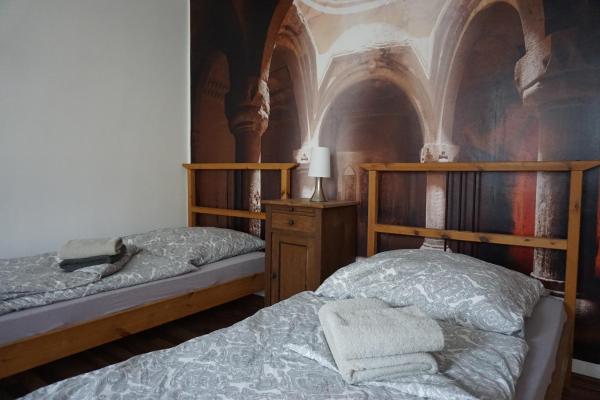 Čtyřlůžkový pokoj s koupelnou — 45 m² - Mitte24