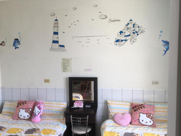 A la foto es mostra l'objecte 隨緣居 situat a la ciutat de Huxi.