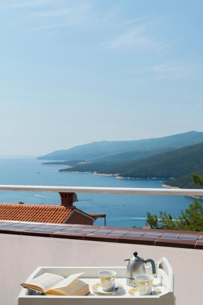 A la foto es mostra l'objecte Lily Apartment situat a la ciutat de Rabac.