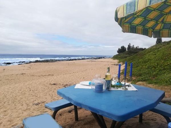 En la foto se muestra el objeto Milkwood Beach Cottages ubicado en la ciudad de Shelly Beach.