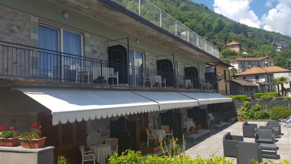 The photo shows the Albergo enoteca Del Lago located in the city of Cannobio.