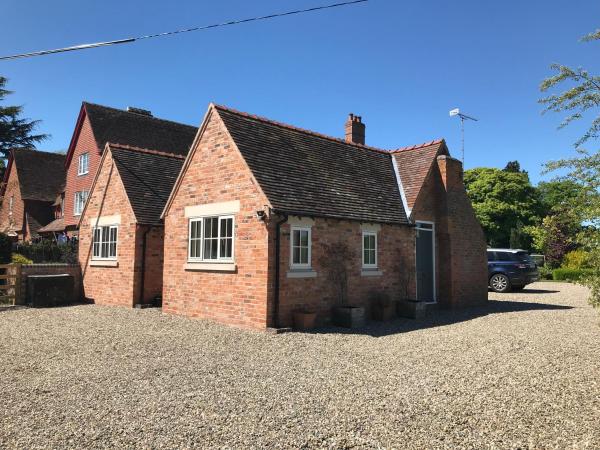 A la foto es mostra l'objecte Pheasant Cottage situat a la ciutat de Harthill.