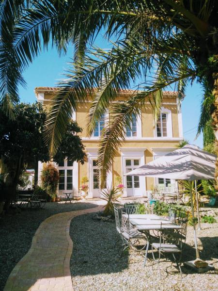 A la foto es mostra l'objecte La Maison des Palmiers situat a la ciutat de Homps.