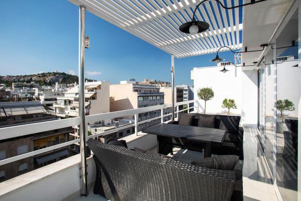 A la foto es mostra l'objecte Unique 3-Bed, 3-Bath Apt with Acropolis Views SG69 situat a la ciutat de Atenes.