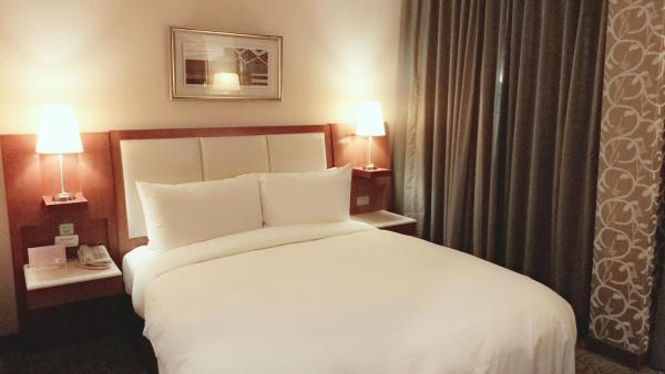 The photo shows the Elegance Hotel located in the city of Taipei.