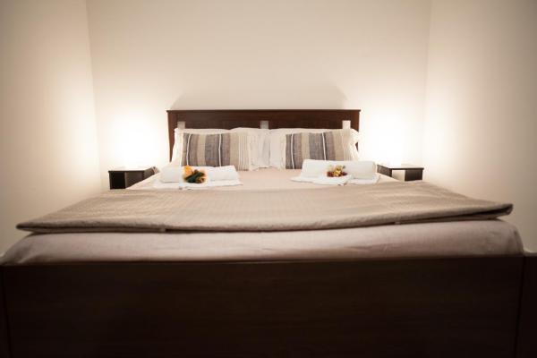 A la foto es mostra l'objecte Casa Benzo situat a la ciutat de Palerm.