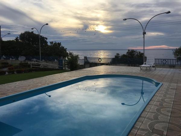 The photo shows the Apto lindo em Alter do chão located in the city of Alter do Chao.