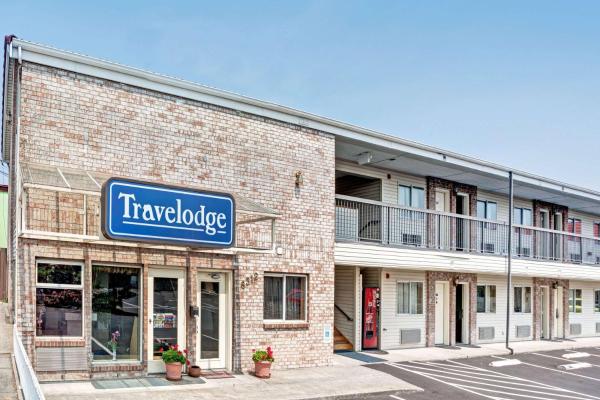 The photo shows the Travelodge by Wyndham Seattle North of Downtown located in the city of Seattle.