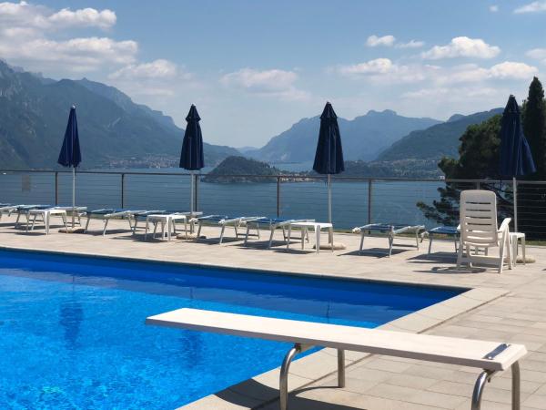 写真にはメナッジョ市にあるTerrazze - Luxury Lake Como View Apartment - in Menaggioが写っています。