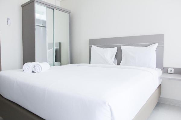 A la foto es mostra l'objecte Cozy Studio Apartment at Elpis Residence By Travelio situat a la ciutat de Jakarta.