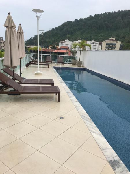 A la foto es mostra l'objecte Apartamento Ubatuba Praia Grande situat a la ciutat de Ubatuba.