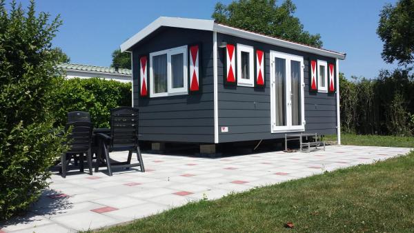 A la foto es mostra l'objecte Tinyhouse de tuinfluiter situat a la ciutat de Geldtienden.