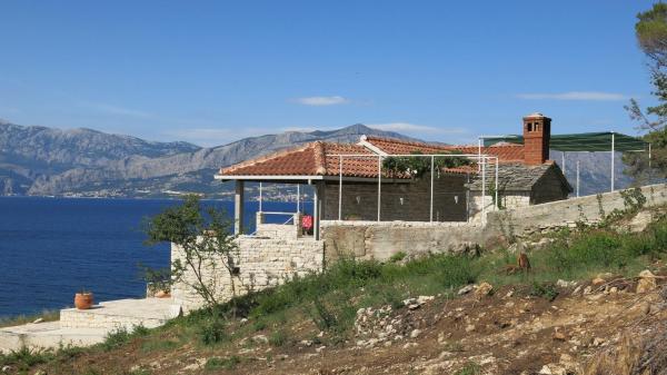 A la foto es mostra l'objecte House Romantica situat a la ciutat de Postira.