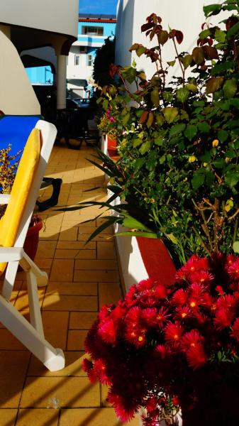 A la foto es mostra l'objecte Apartamentos e Quartos Atalaia situat a la ciutat de Sagres.