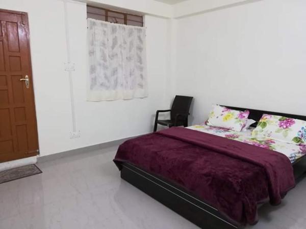 A la foto es mostra l'objecte Delight Homestay situat a la ciutat de Mawsynrām.