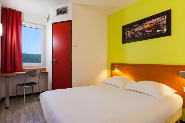Auf dem Foto ist das Objekt Enzo Hotels Chalons en Champagne in der Stadt Bouy zu sehen.