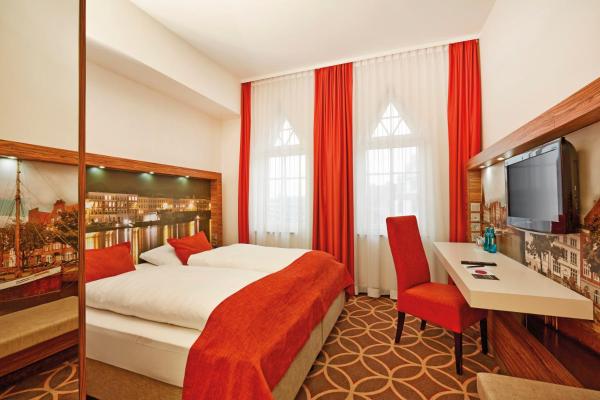 照片显示了位于Lübeck市的H+ Hotel Lübeck物件。