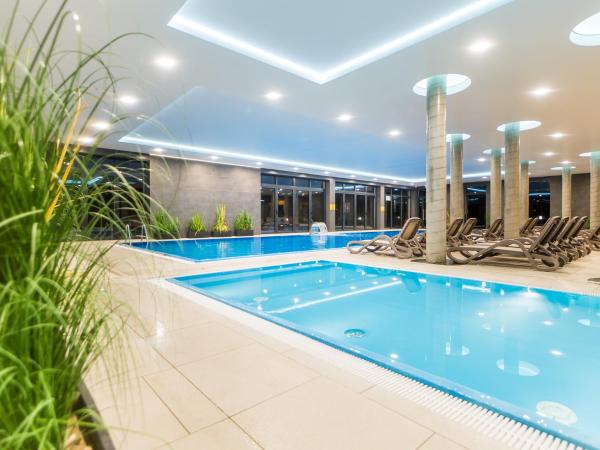 Kuvassa näkyy kohde Lux Apartment Kołobrzeg Polanki Park, joka sijaitsee kaupungissa Kołobrzeg.