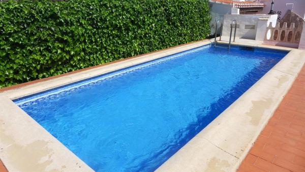 A la foto es mostra l'objecte Anacasa Villa Faig Playa Burguera Terranova CH2500 situat a la ciutat de Oliva.