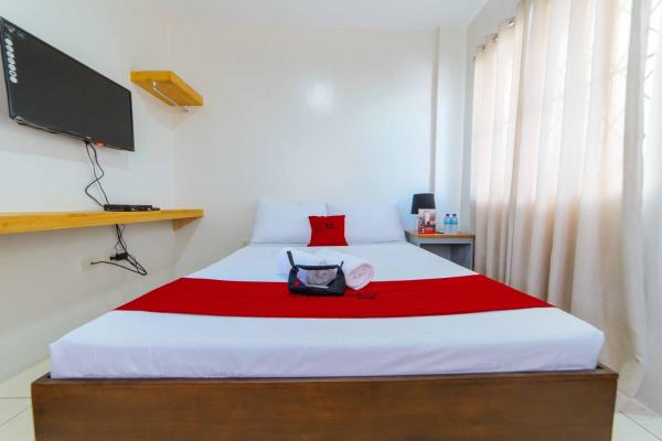 Na fotografii je vidět objekt RedDoorz Plus @ Casa Lucia Sindalan San Fernando City Pampanga nacházející se ve městě Malpitic.