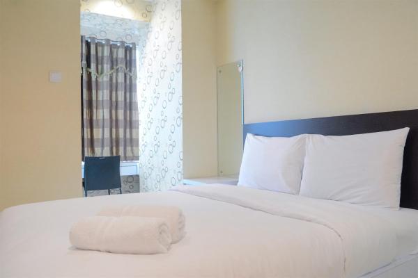 写真にはCinere市にあるGorgeous Studio Cinere Bellevue Suites Apartment By Travelioが写っています。