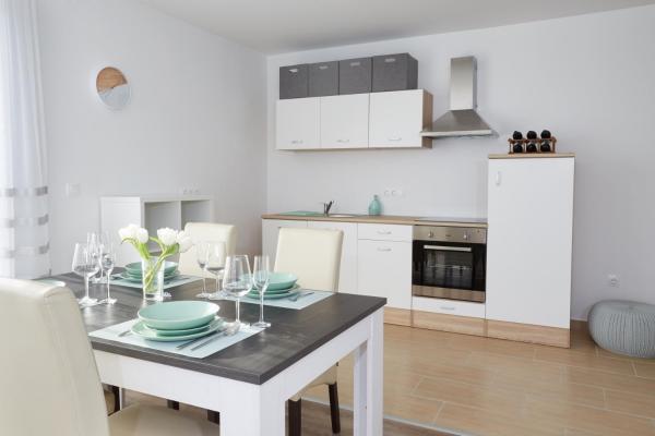 Na fotografii je vidět objekt Panorama Apartmanok nacházející se ve městě Magyarbóly.