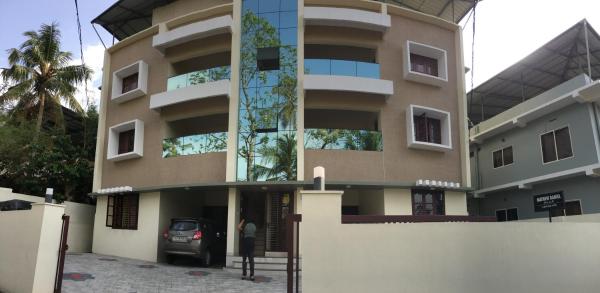 The photo shows the Athrakkattu Enclave located in the city of Vempayam.