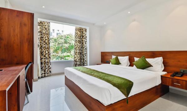 The photo shows the Treebo Blu Orchid located in the city of Bengaluru.