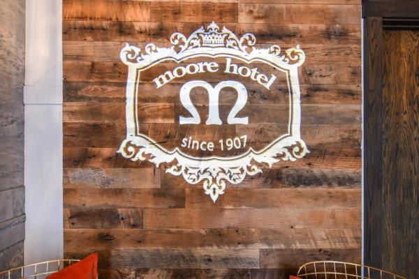 The photo shows the Moore Hotel located in the city of Seattle.