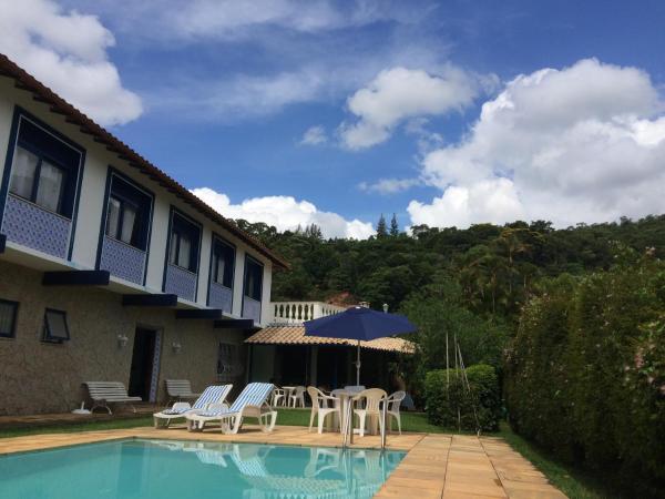 A la foto es mostra l'objecte Bela e Aconchegante Casa em Itaipava situat a la ciutat de Petrópolis.