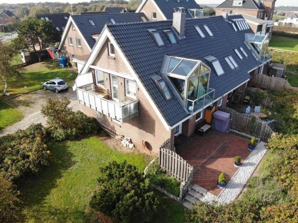 A la foto es mostra l'objecte Haus-am-Deich situat a la ciutat de Wittdün.
